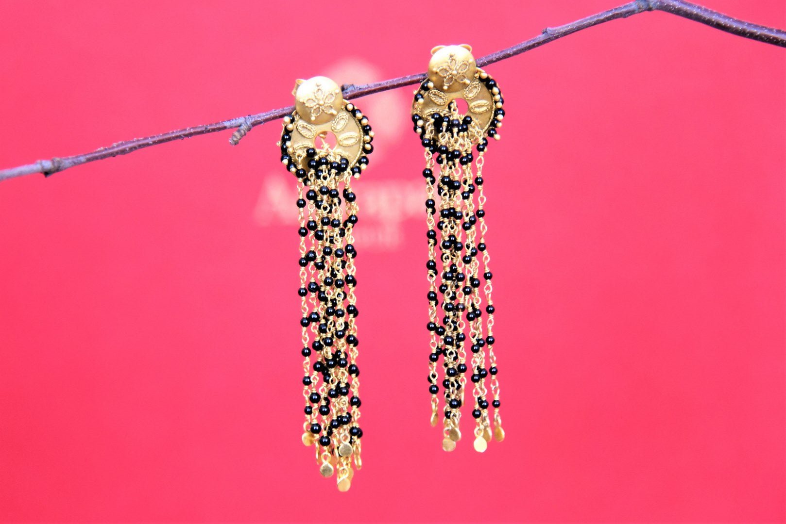 Shop stunning Amrapali gold plated and black beads tassel earrings online in USA. Look beautiful in Indian jewelry, gold plated jewelry , silver jewelry, gold plated earrings, wedding jewellery from Pure Elegance Indian fashion store in USA.-full view