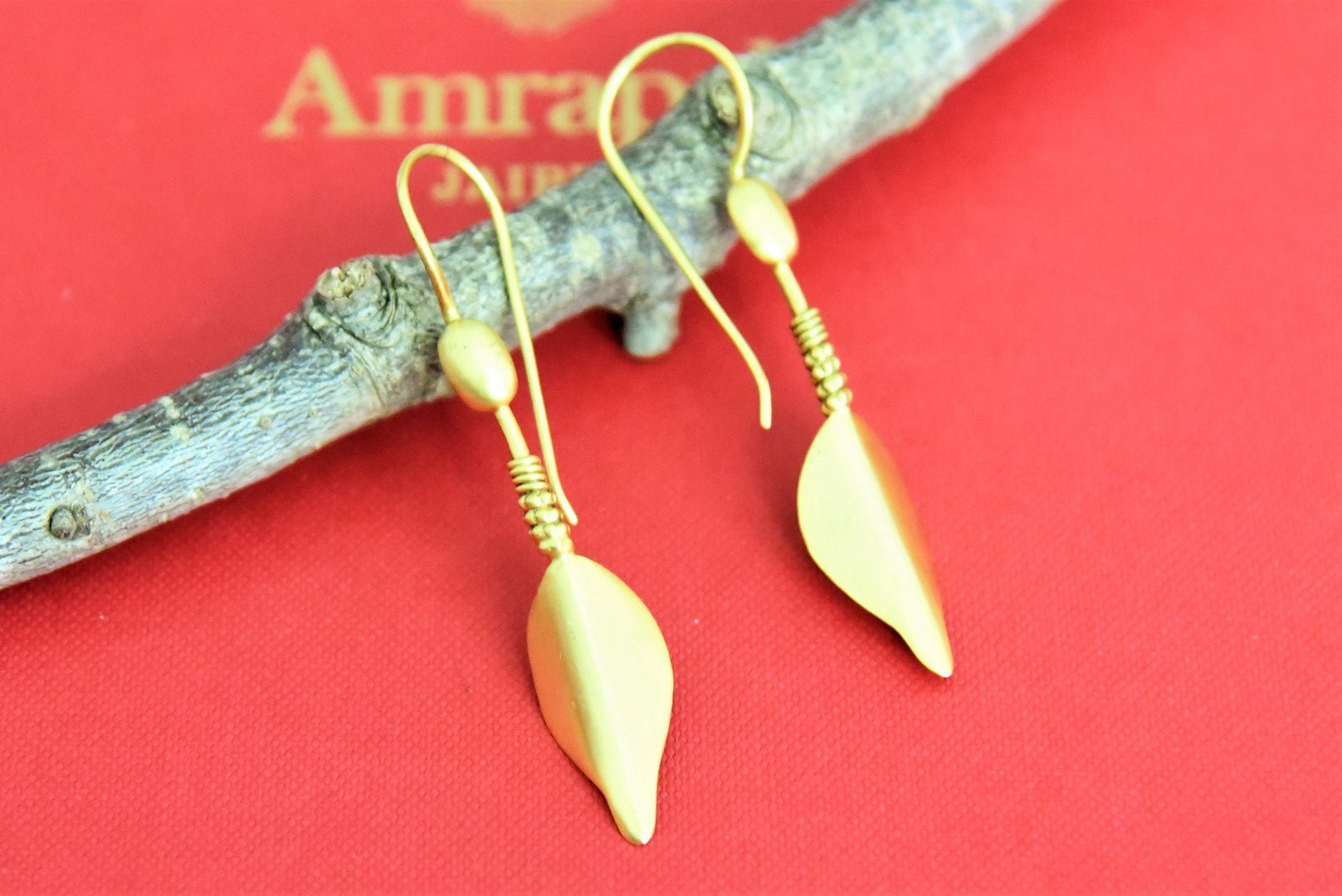 Buy Amrapali gold plated leaf drop earrings online in USA. Look beautiful in Indian jewelry, gold plated jewelry , silver jewelry, gold plated earrings, wedding jewellery from Pure Elegance Indian fashion store in USA.-full view