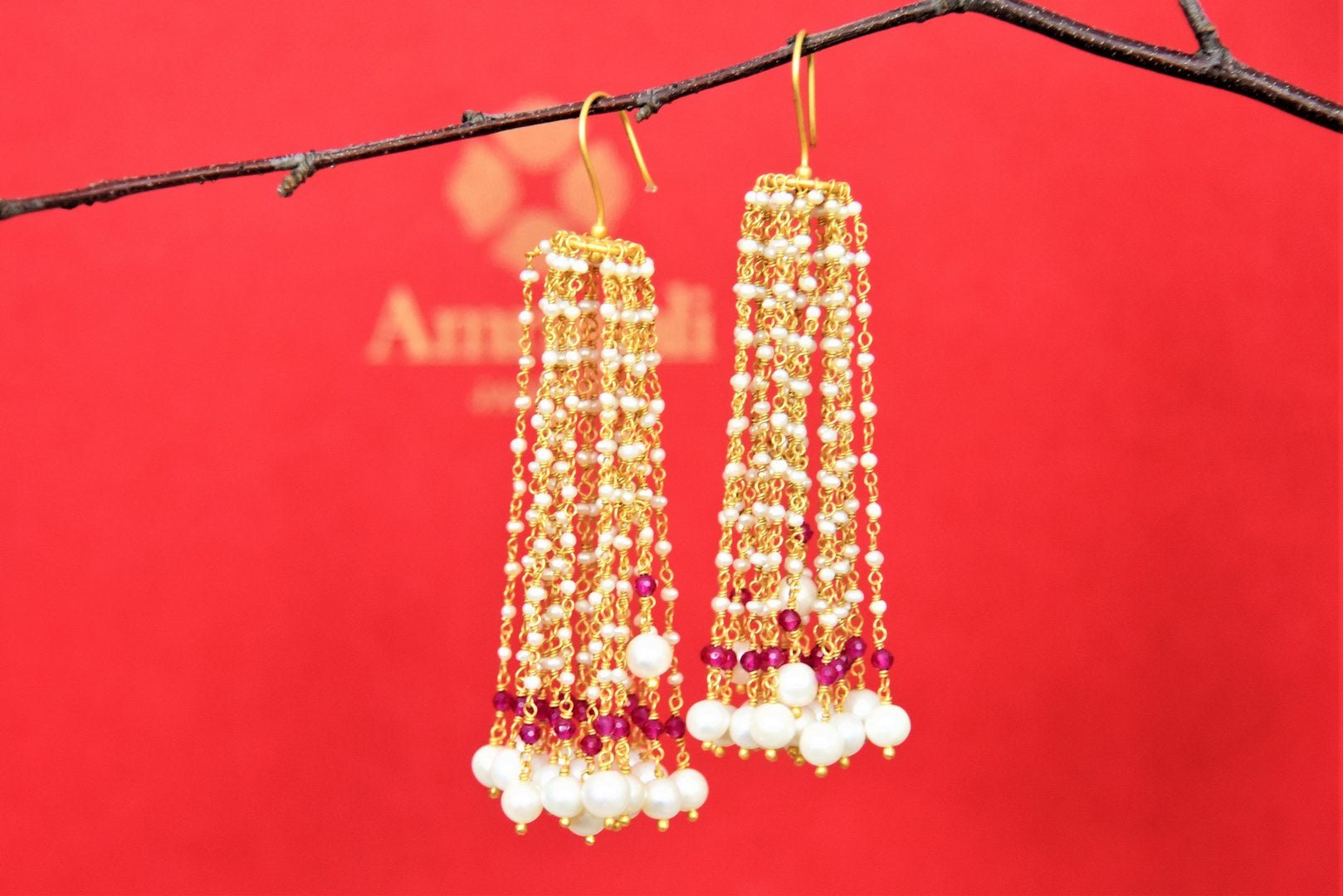 Buy stunning gold plated pearl tassel earrings online in USA. Look beautiful in Indian jewelry, gold plated jewelry , silver jewelry, gold plated earrings, wedding jewellery from Pure Elegance Indian fashion store in USA.-full view