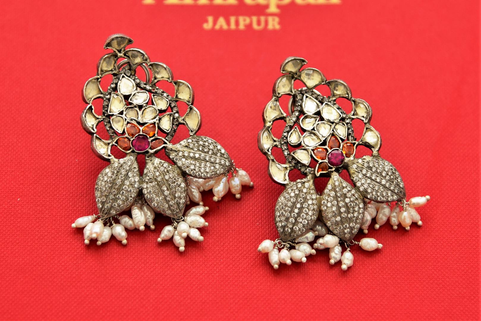 Shop beautiful gold plated kundan zircon leaf earings online  in USA with pearls. Shop gold plated Amrapali jewelry, silver jewelry, wedding jewelry , gold plated earrings from Pure Elegance Indian fashion store in USA.-full view