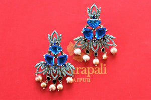 Shop stunning gold plated blue stone floral earrings online in USA with pearl drops. Shop exclusive gold plated jewelry, wedding jewelry , bridal jewelry, gold plated earrings, silver jewelry from Amrapali at Pure Elegance Indian fashion store in USA.-full view