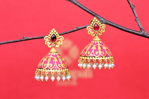 Shop Amrapali gold plated pink enamel jhumki online in USA with pearl drops. Look beautiful in Indian jewelry, gold plated jewelry , silver jewelry, gold plated earrings, wedding jewellery from Pure Elegance Indian fashion store in USA.-full view