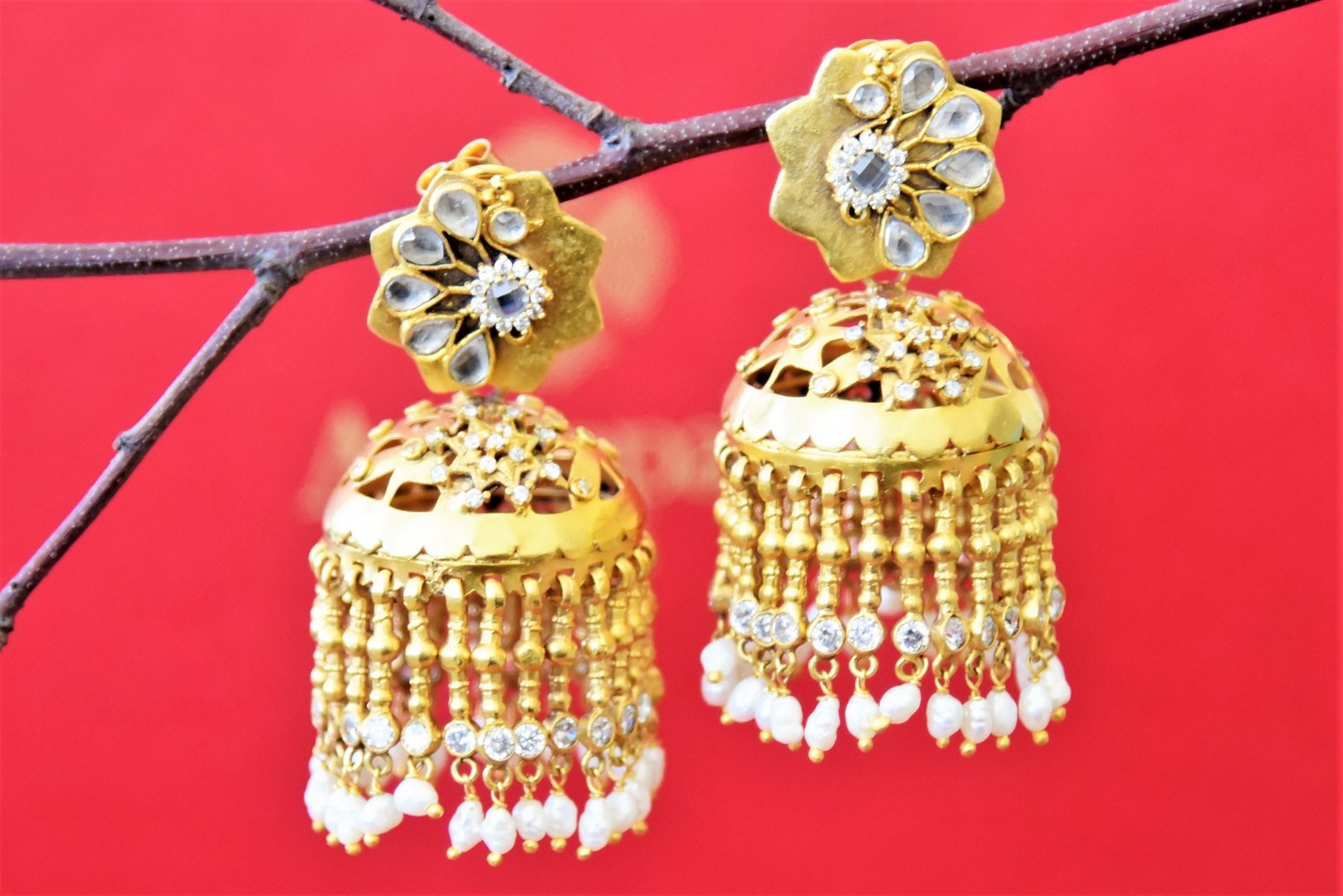 Buy stunning gold plated glass jhumka earrings online  in USA with pearl drops. Shop gold plated Amrapali jewelry, silver jewelry, wedding jewelry , gold plated earrings from Pure Elegance Indian fashion store in USA.-full view