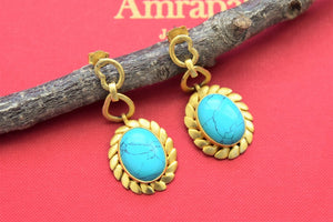Shop stunning turquoise stone drop gold plated earrings online in USA. Shop gold plated jewelry, silver jewelry,  silver earrings, bridal jewelry, fashion jewelry from Amrapali from Pure Elegance Indian clothing store in USA.-full view