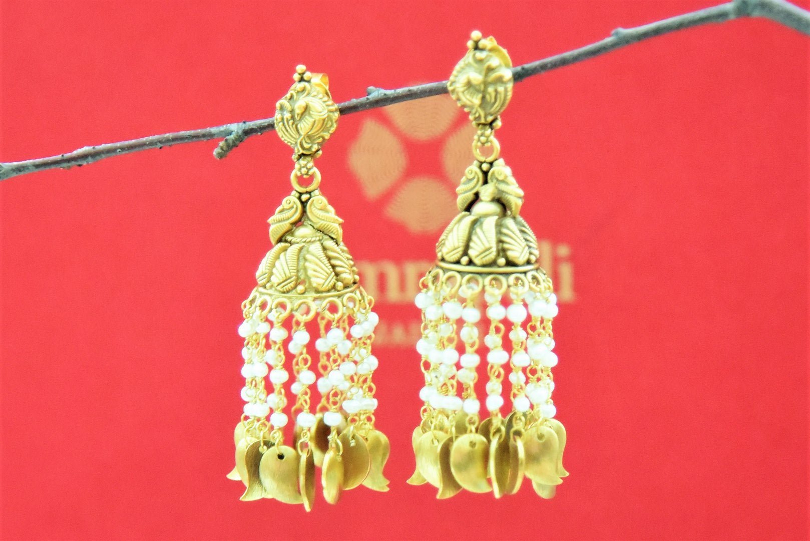 Shop Amrapali gold plated jhumka earrings online in USA with pearl tassels. Look beautiful in Indian jewelry, gold plated jewelry , silver jewelry, gold plated earrings, wedding jewellery from Pure Elegance Indian fashion store in USA.-full view
