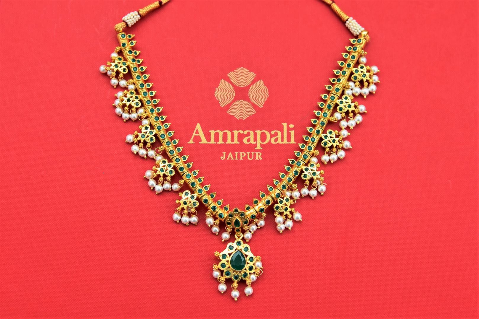 Shop traditional gold plated green stone necklace online in USA with pearls. Shop gold plated jewelry, silver jewelry,  silver earrings, bridal jewelry, fashion jewelry from Amrapali from Pure Elegance Indian clothing store in USA.-full view