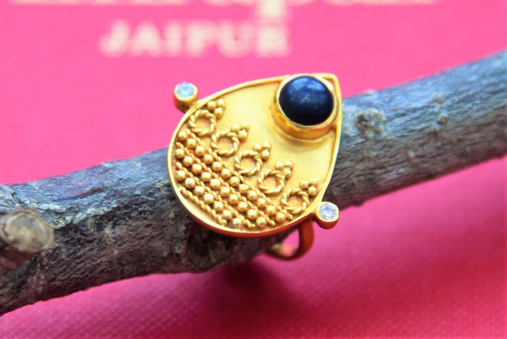 Shop stunning Amrapali gold plated drop ring online in USA with blue stone. Shop beautiful gold plated jewelry, kundan jewelry, bridal jewelry, silver jewelry in USA from Pure Elegance Indian fashion store in USA.-front