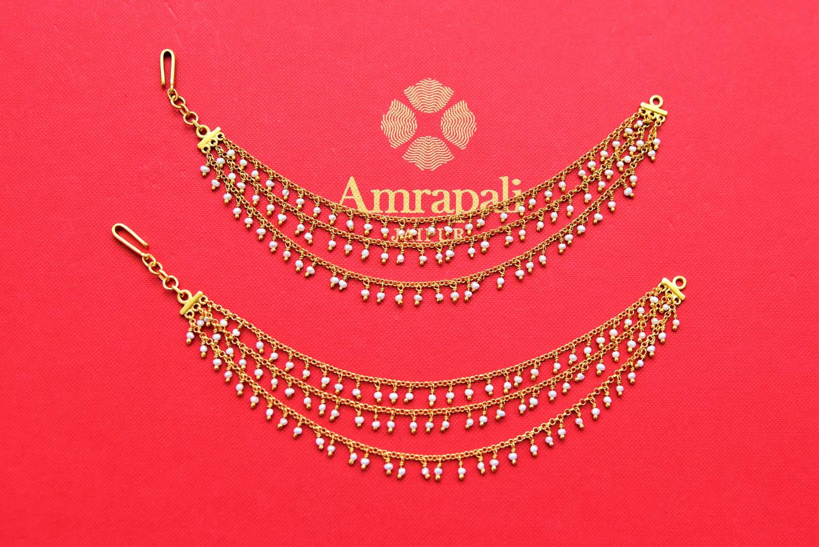 Buy Amrapali gold plated ear chain online in USA with pearl drops. Shop gold plated jewelry, silver jewelry,  silver earrings, bridal jewelry, fashion jewelry from Amrapali from Pure Elegance Indian clothing store in USA.-full view
