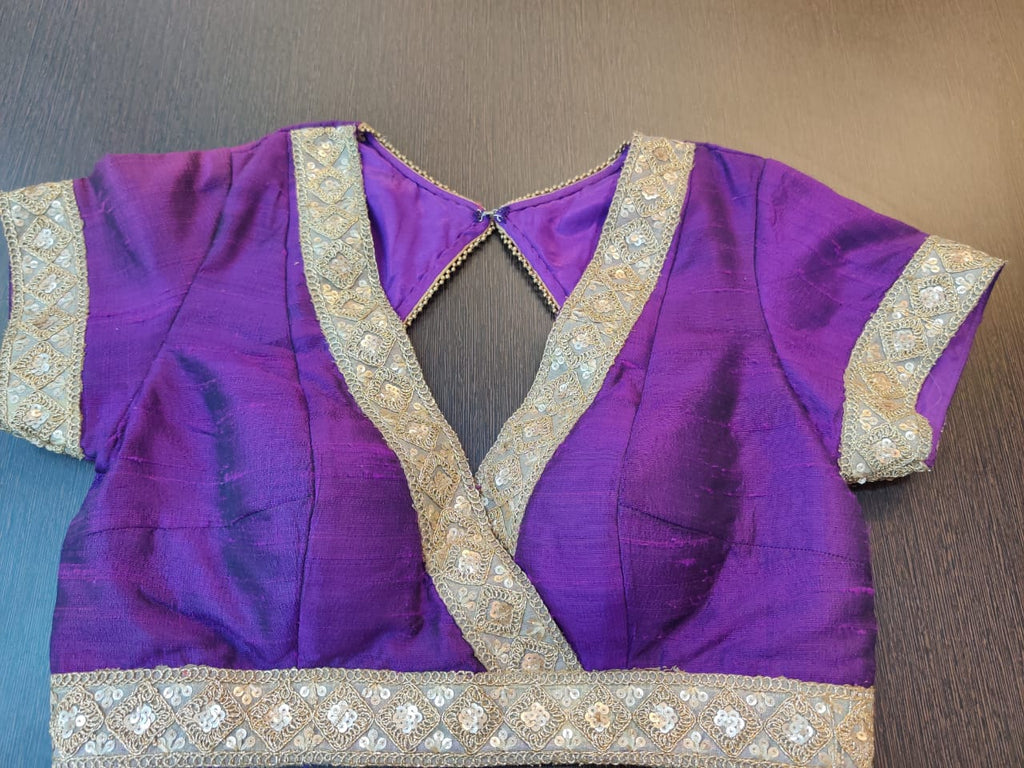 Buy stunning purple designer saree blouse online in USA with embroidered border. Elevate your ethnic sari style with a stunning collection of designer sari blouses, embroidered saree blouses, Banarasi sari blouse, fancy sari blouse from Pure Elegance Indian clothing store in USA.-front