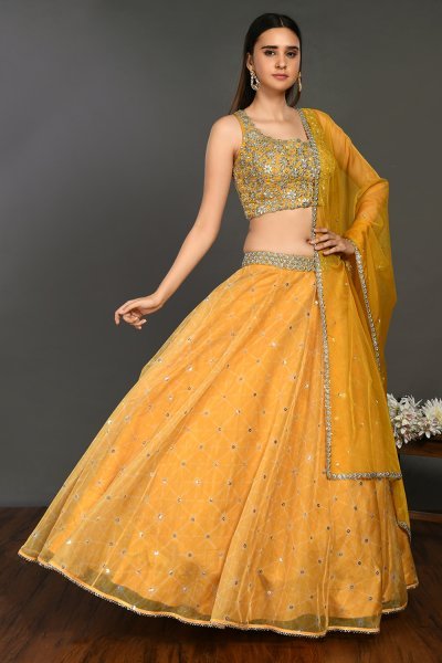 Buy stunning yellow organza lehenga online in USA with dupatta. Get festive ready in beautiful designer Anarkali suits, designer lehenga, wedding gowns, sharara suits, designer sarees from Pure Elegance Indian fashion store in USA.-full view