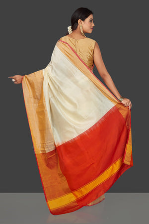 Shop elegant off-white Uppada silk saree online in USA with golden zari border. Keep it elegant with handwoven silk sarees, Uppada silk sarees, soft silk sarees from Pure Elegance Indian fashion boutique in USA. We bring a especially curated collection of ethnic sarees for Indian women in USA under one roof!-back