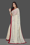 Buy elegant off-white embroidered georgette saree online in USA with saree blouse. Radiate elegance with embroidered sarees with blouse, georgette sarees from Pure Elegance Indian fashion boutique in USA. We bring a especially curated collection of ethnic saris for Indian women in USA under one roof!-full view