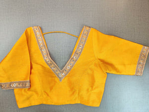 Buy stunning yellow embroidered sari blouse online in USA. Elevate your Indian ethnic saree looks with beautiful readymade saree blouse, embroidered sari blouses, Banarasi saree blouse, designer sari from Pure Elegance Indian fashion store in USA.-full view
