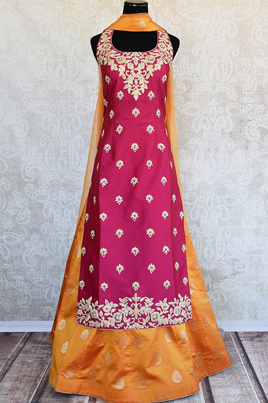 Buy Pink and yellow banarasi silk skirt-kurta with full heavy embroidery and buta comes with dupatta. Ideal for wedding parties.-Full view