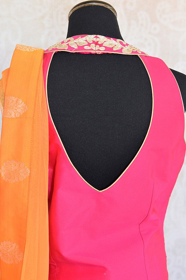Buy Pink and yellow banarasi silk skirt-kurta with full heavy embroidery and buta comes with dupatta. Ideal for wedding parties.-Back design