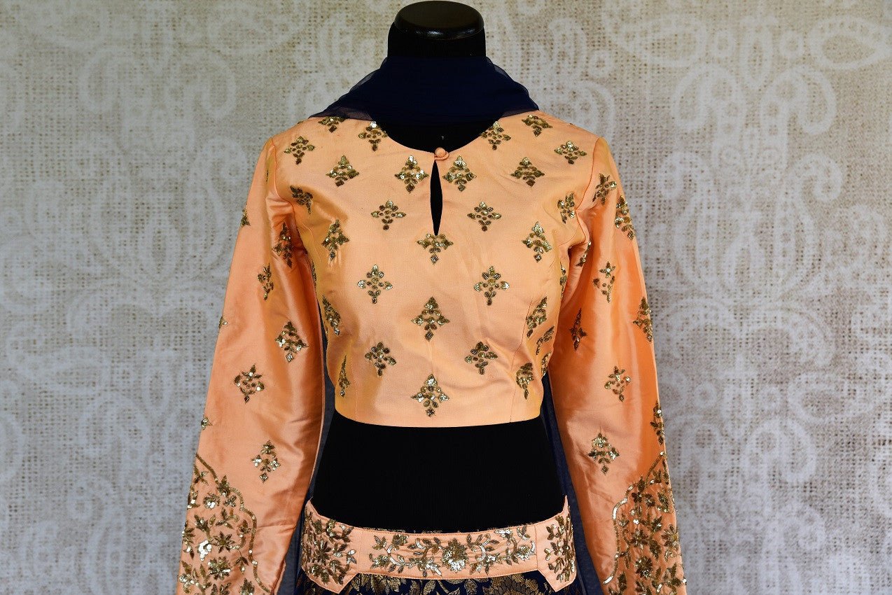 Buy online designer blue Banarasi skirt with peach embroidered blouse with dupatta .  Pure Elegance store brings Indian designer lehenga choli online in USA.-blouse
