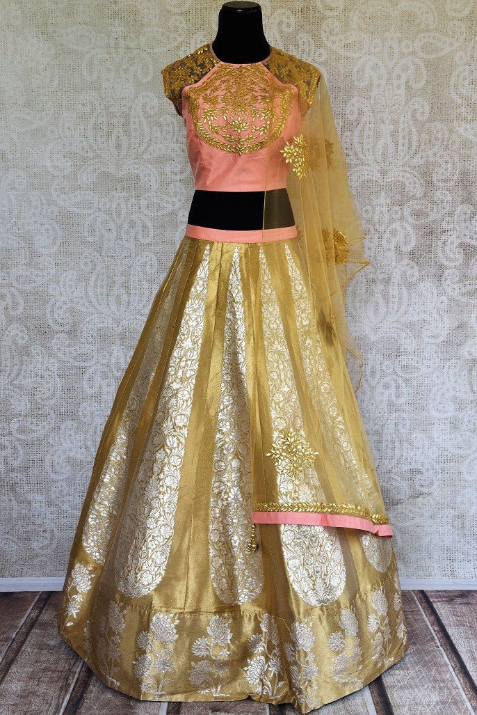 Buy online designer gold Banarasi skirt with peach gota patti blouse with net dupatta .  Pure Elegance store brings Indian formal dresses online in USA for every occasion.-full view