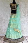 Buy green banarasi skirt with gota patti blue blouse & net dupatta online in USA. Pure Elegance store brings an exquisite range of Indian dresses online for women in USA.-full view