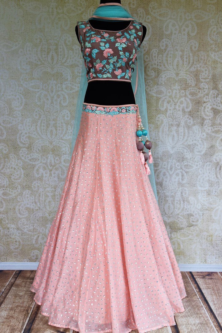 Buy pink and blue embroidered lehenga choli online from Pure Elegance with dupatta. Our fashion store brings stunning Indian designer lehenga choli in USA for women.-full view
