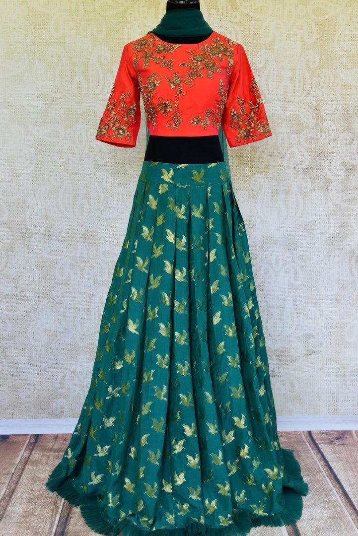 Buy orange zardozi choli with green Banarasi skirt with dupatta online in USA. Pure Elegance fashion store brings a stunning range of Indian lehenga choli in USA.-full view