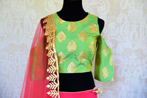 Buy pink and green applique silk lehenga with dupatta online in USA. Pure Elegance fashion store brings a stunning range of Indian wedding lehengas in USA for weddings.-blouse