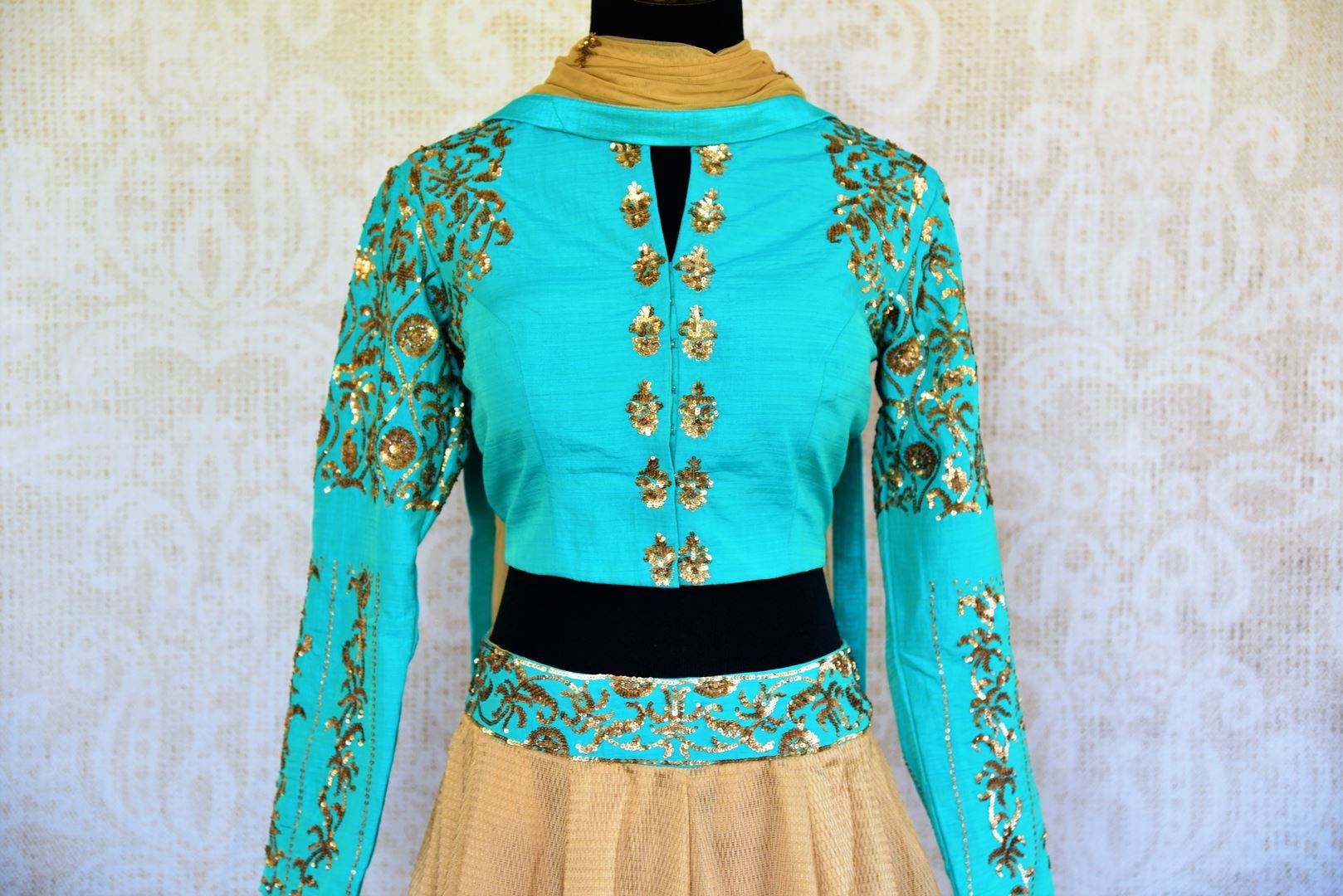 Buy blue and beige sequin embroidery silk lehenga with dupatta online in USA. Pure Elegance fashion store brings a stunning range of Indian wedding lehengas in USA.-blouse