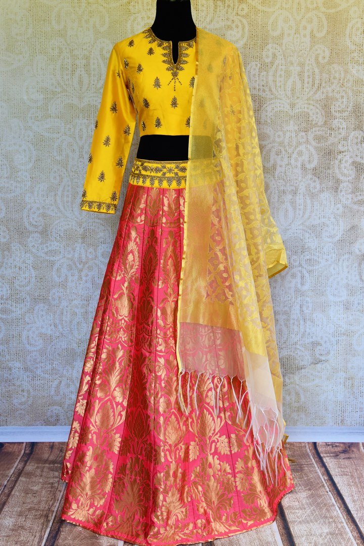 Buy yellow and pink silk lehenga online in usa with zardozi work. Pure Elegance fashion store brings an exquisite range of Indian designer lehengas in USA for women.-full view