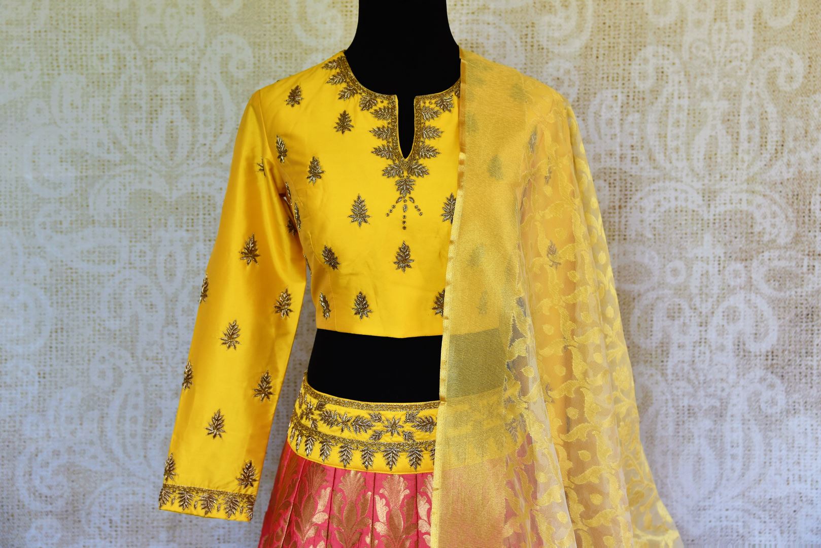Buy yellow and pink silk lehenga online in usa with zardozi work. Pure Elegance fashion store brings an exquisite range of Indian designer lehengas in USA for women.-blouse
