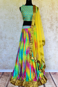 Buy blue gota patti silk blouse online in usa with multicolor skirt. Pure Elegance fashion store brings an exquisite range of Indian designer lehenga choli in USA.-full view