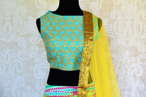 Buy blue gota patti silk blouse online in usa with multicolor skirt. Pure Elegance fashion store brings an exquisite range of Indian designer lehenga choli in USA.-blouse