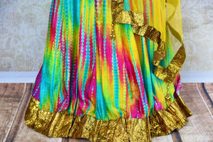Buy blue gota patti silk blouse online in usa with multicolor skirt. Pure Elegance fashion store brings an exquisite range of Indian designer lehenga choli in USA.-skirt