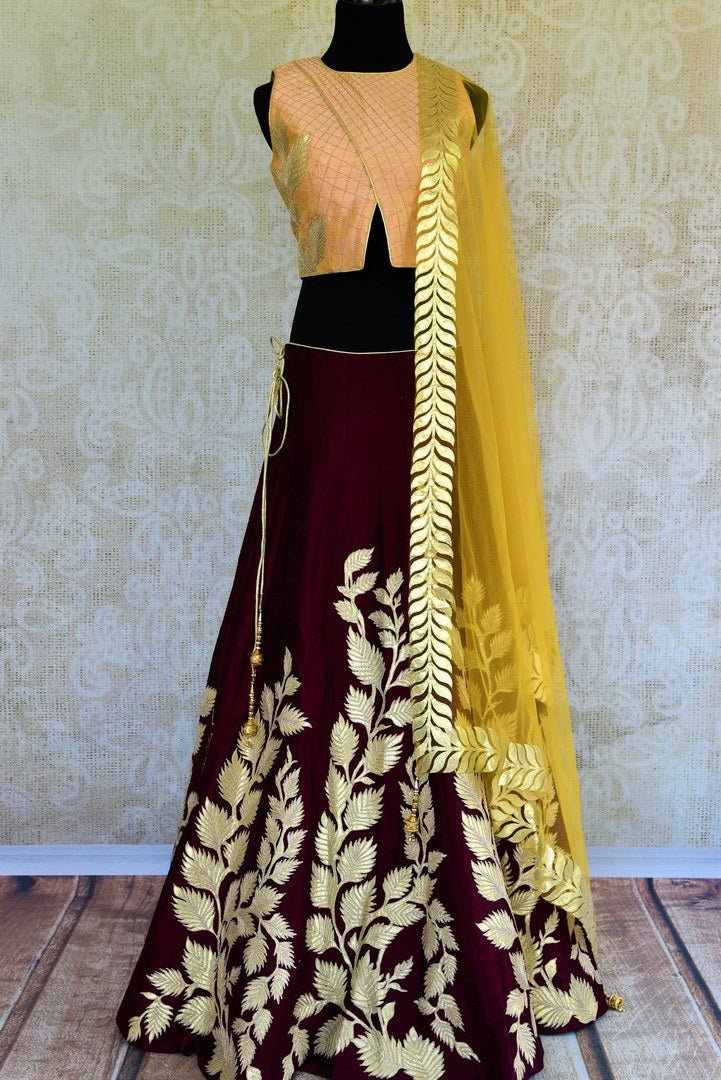 Buy peach and maroon applique work silk lehenga online in USA. Pure Elegance fashion store brings a stunning range of Indian designer lehenga in USA for weddings.-full view