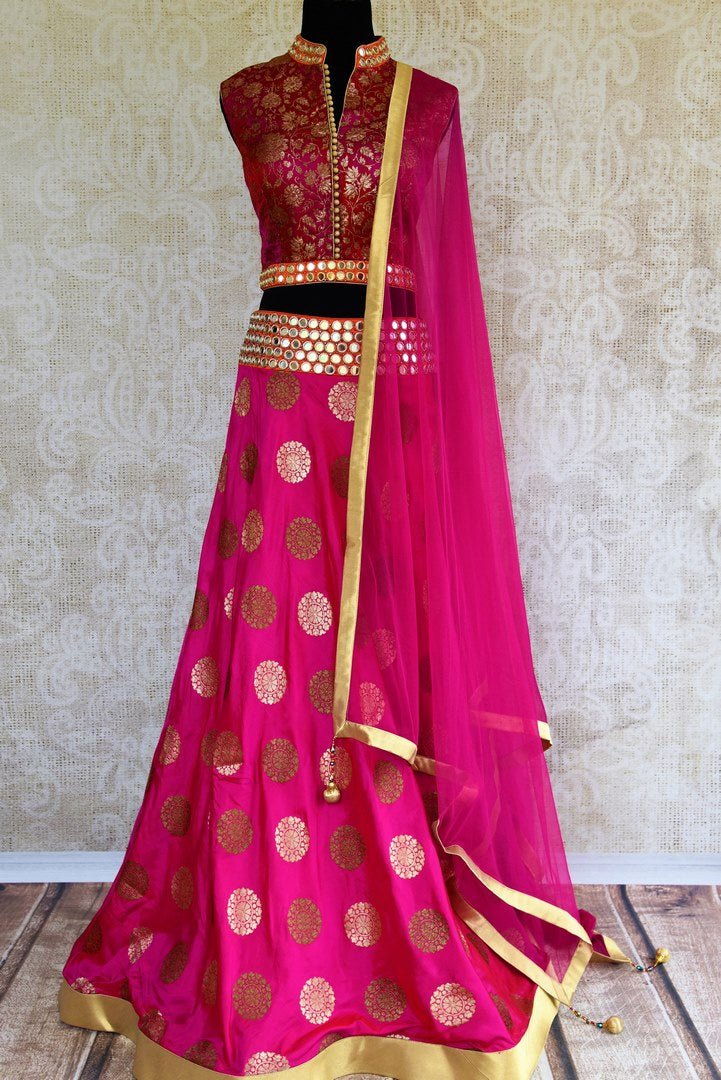Buy pink mirror work Banarasi lehenga with dupatta online in USA. Pure Elegance clothing store brings an exquisite range of Indian designer lehengas in USA. Shop online.-full view
