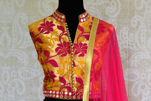 Buy bright pink mirror work Banarasi lehenga with dupatta online in USA. Pure Elegance clothing store brings an exquisite range of Indian designer dresses in USA. -blouse pallu