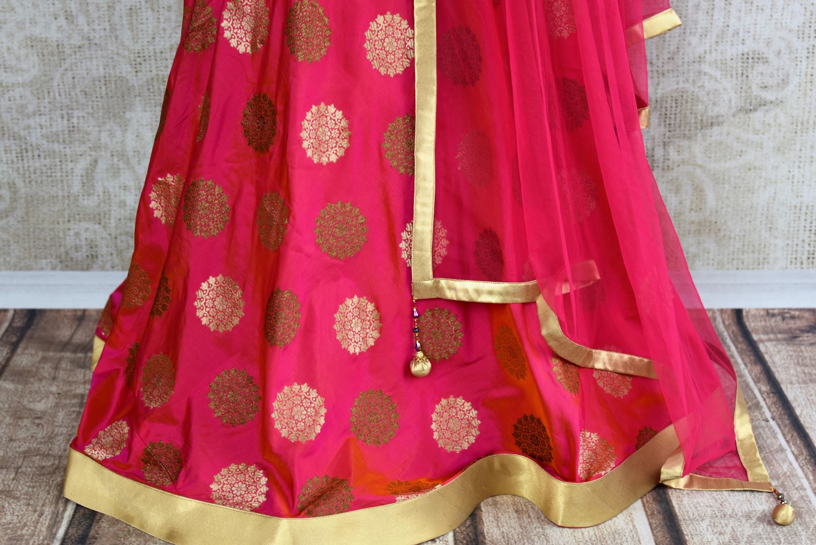 Buy bright pink mirror work Banarasi lehenga with dupatta online in USA. Pure Elegance clothing store brings an exquisite range of Indian designer dresses in USA. -details