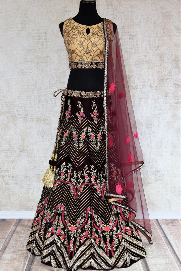 Buy purple embroidered velvet lehenga with dupatta online in USA . The designer lehenga is a captivating choice for weddings. Shop Indian wedding lehengas in USA from an alluring collection available at Pure Elegance clothing store.-full view