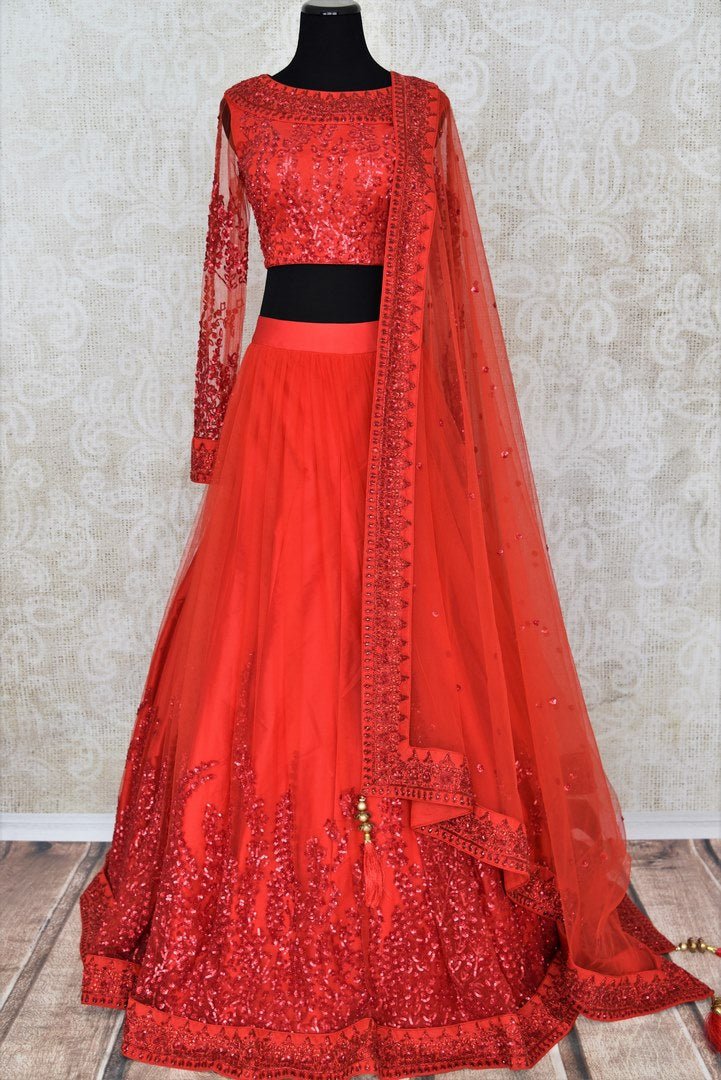 Buy red ticki work designer net lehenga with dupatta online in USA. Add brilliance to your Indian wedding look with an exquisite range of designer wedding lehengas available at Pure Elegance exclusive clothing store in USA or shop online.-full view