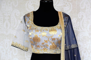 Buy yellow and grey embroidered Banarasi net lehenga with dupatta online in USA . The gorgeous lehenga is a captivating choice for weddings. Shop Indian designer lehengas in USA from an alluring collection available at Pure Elegance clothing store.-blouse