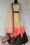 Grace this festive season with this meticulously crafted gold silk net embroidery lehenga with embellished sheer net dupatta. Bring flavour to your attire with this gorgeously handcrafted gold silk lehenga skirt. Shop graceful Indian dresses, designer silk saris, beautiful lehengas online or visit Pure Elegance in USA.-full view