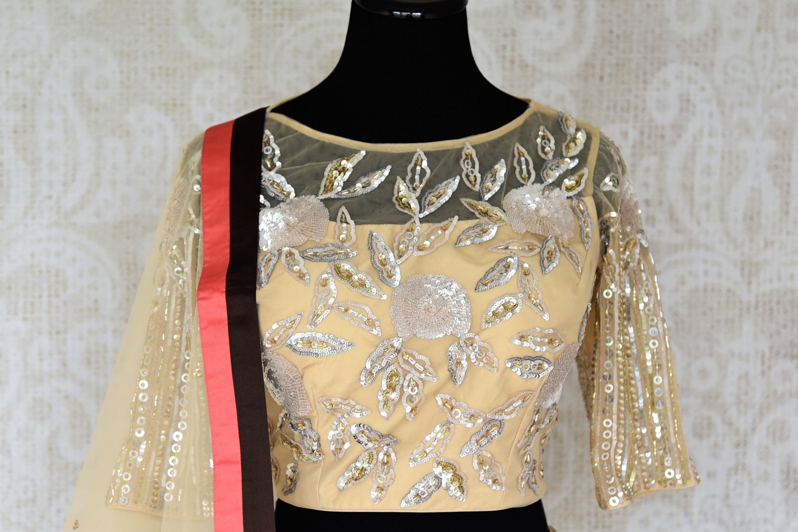 Grace this festive season with this meticulously crafted gold silk net embroidery lehenga with embellished sheer net dupatta. Bring flavour to your attire with this gorgeously handcrafted gold silk lehenga skirt. Shop graceful Indian dresses, designer silk saris, beautiful lehengas online or visit Pure Elegance in USA.-blouse dupatta