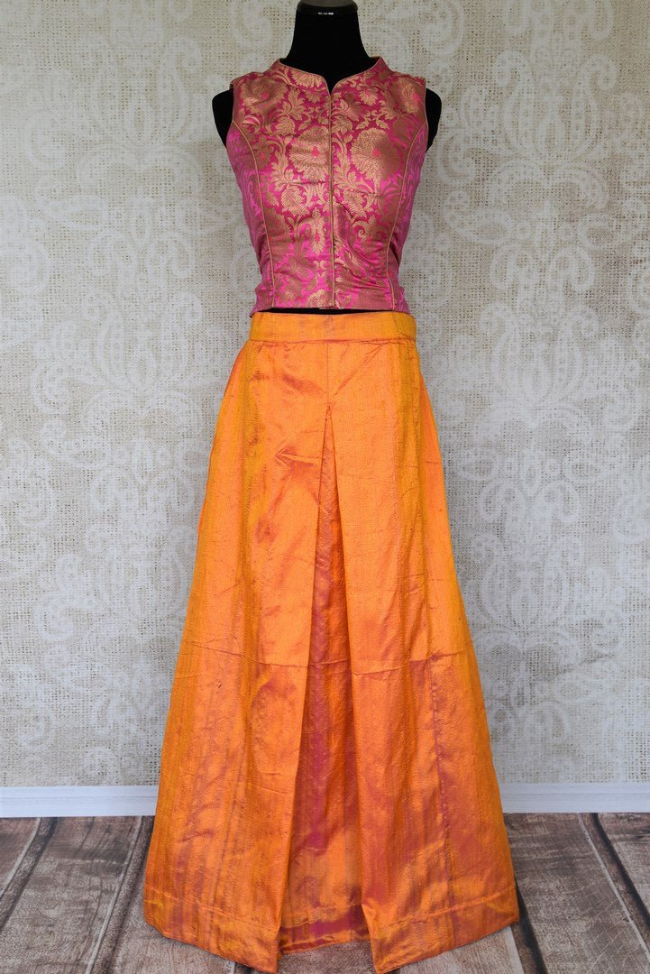 Dazzle at your BFF's wedding in this trendy Orange silk palazzo skirt with a hot pink banarsi blouse.The celeb-inspired ensemble is exquisitely designed for fashionable women. Shop beautiful and trendy Indian dresses, lehenga skirts, traditional dresses online or visit Pure Elegance store in USA. -full view
