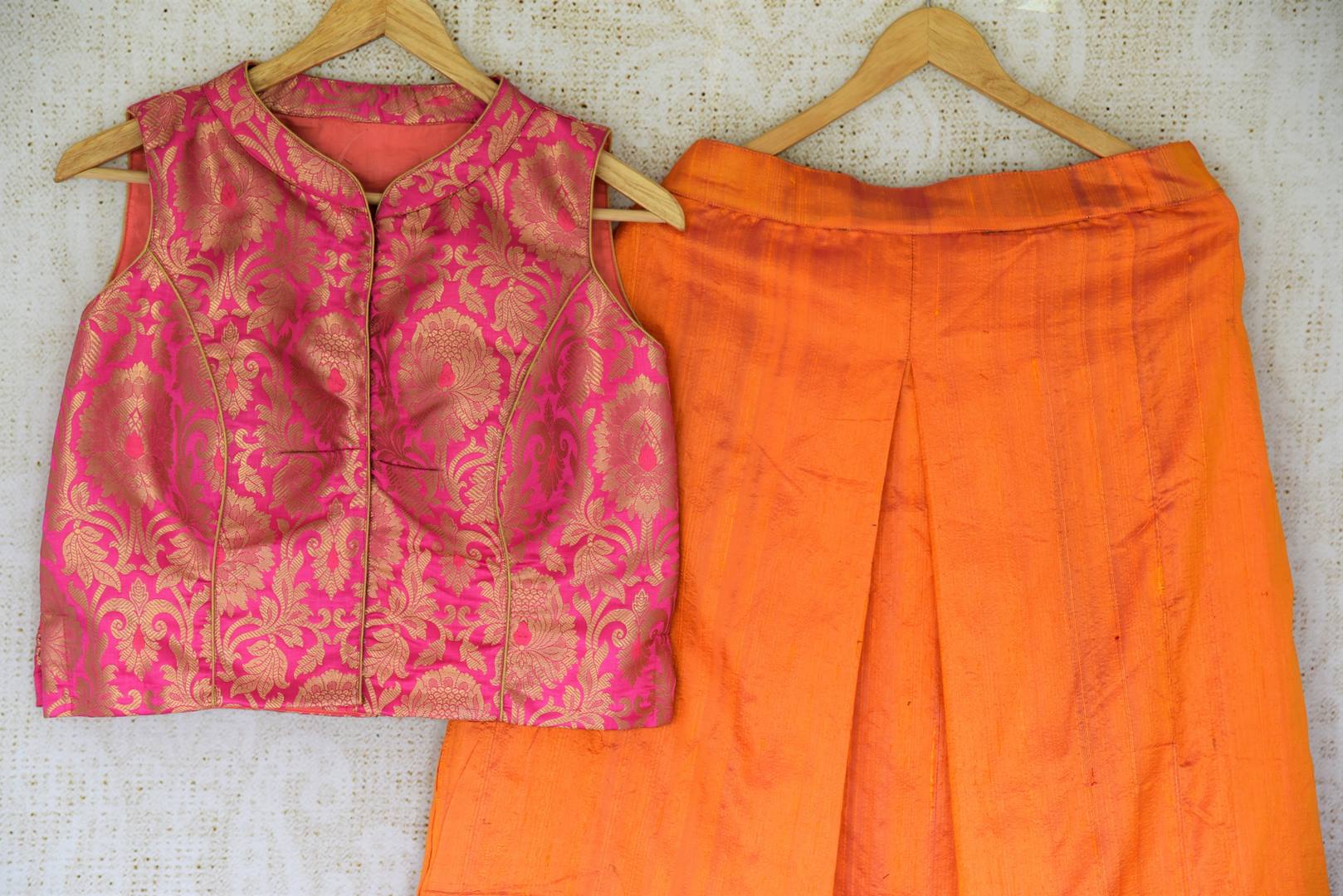 Dazzle at your BFF's wedding in this trendy Orange silk palazzo skirt with a hot pink banarsi blouse.The celeb-inspired ensemble is exquisitely designed for fashionable women. Shop beautiful and trendy Indian dresses, lehenga skirts, traditional dresses online or visit Pure Elegance store in USA. -details