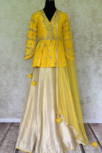Buy yellow embroidered peplum kurti with skirt online in USA and dupatta. Make every occasion special by choosing the best of designer dresses from Pure Elegance Indian clothing store in USA, Shop from a range of stunning designer lehengas, wedding dresses, Indian clothing from our online store.-full view