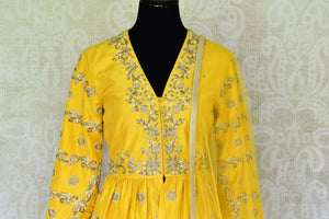 Buy yellow embroidered peplum kurti with skirt online in USA and dupatta. Make every occasion special by choosing the best of designer dresses from Pure Elegance Indian clothing store in USA, Shop from a range of stunning designer lehengas, wedding dresses, Indian clothing from our online store.-kurti front