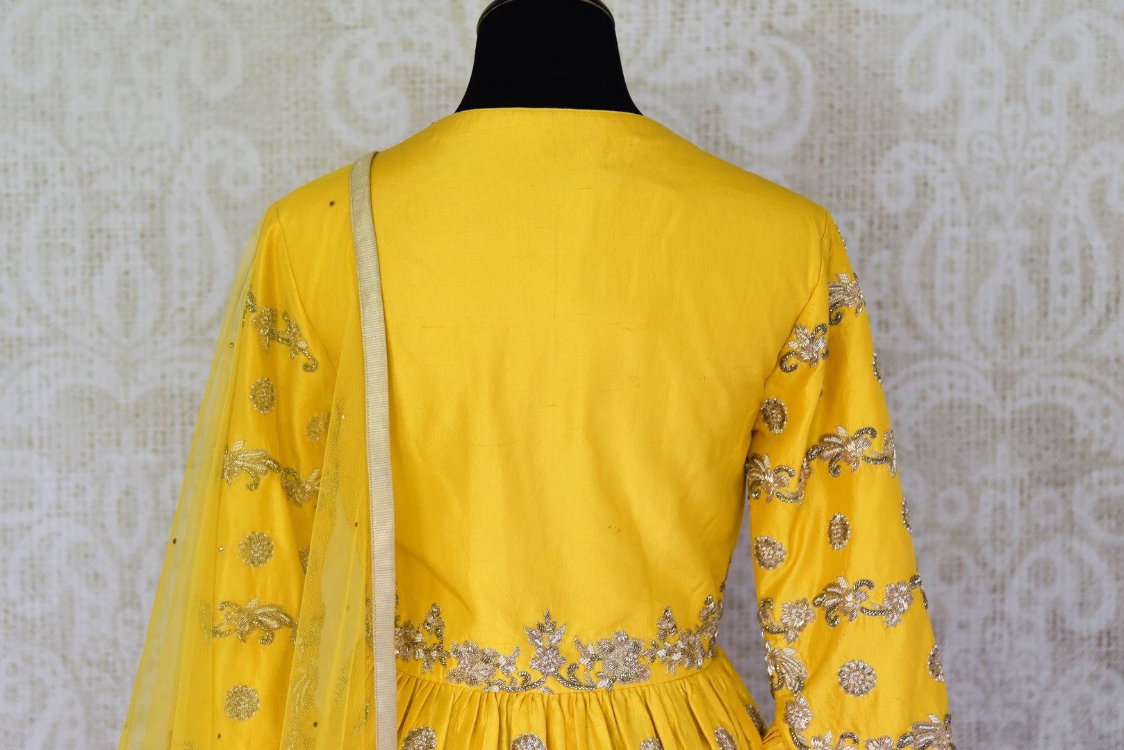 Buy yellow embroidered peplum kurti with skirt online in USA and dupatta. Make every occasion special by choosing the best of designer dresses from Pure Elegance Indian clothing store in USA, Shop from a range of stunning designer lehengas, wedding dresses, Indian clothing from our online store.-kurti back