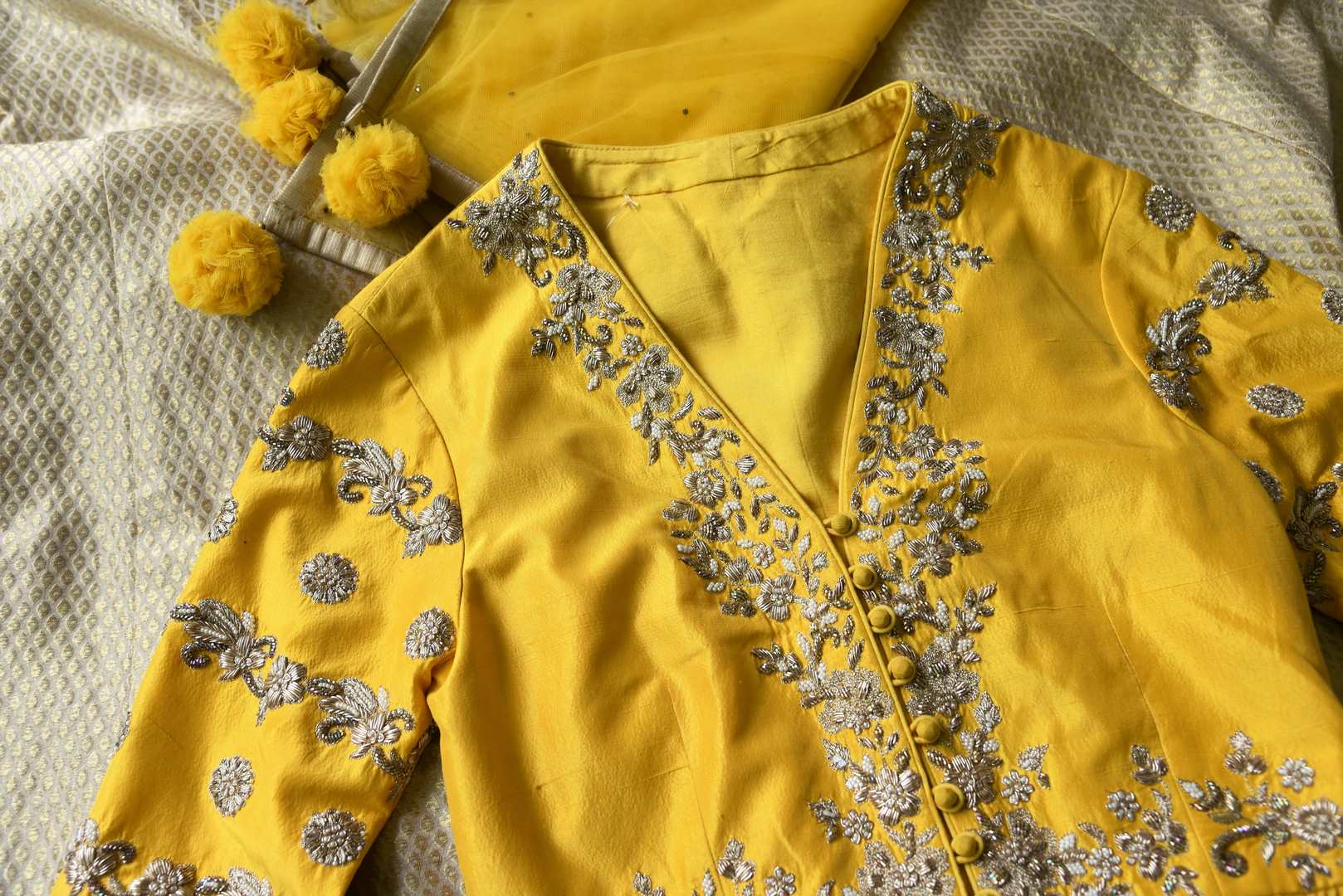 Buy yellow embroidered peplum kurti with skirt online in USA and dupatta. Make every occasion special by choosing the best of designer dresses from Pure Elegance Indian clothing store in USA, Shop from a range of stunning designer lehengas, wedding dresses, Indian clothing from our online store.-details