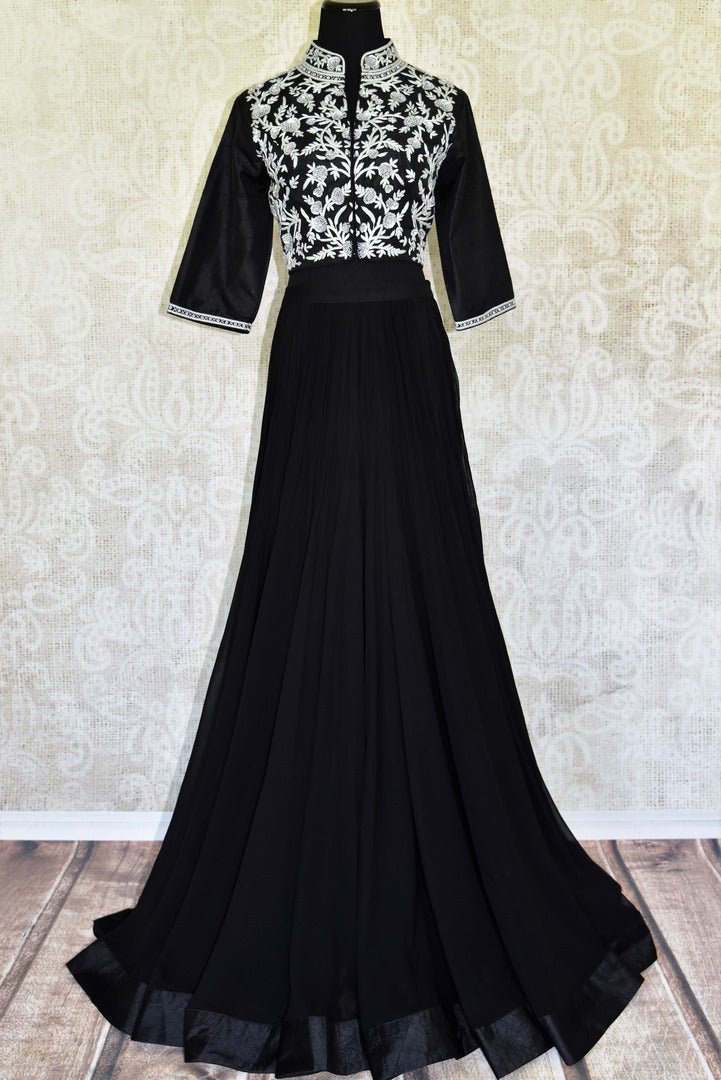 This jaw-dropping black raw silk floor-length skirt is a versatile piece for your wardrobe. Style it right with a hand embroidered floral designer monochrome blouse. Shop designer anarkali suits, kurta sets, lehenga sets online or visit Pure Elegance store, USA. -full view