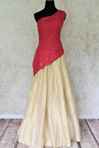 Buy online pink embroidered blouse with gold silk skirt in USA. Add style to your look with Indian designer dresses available at Pure Elegance Indian fashion store in USA or shop online.-full view