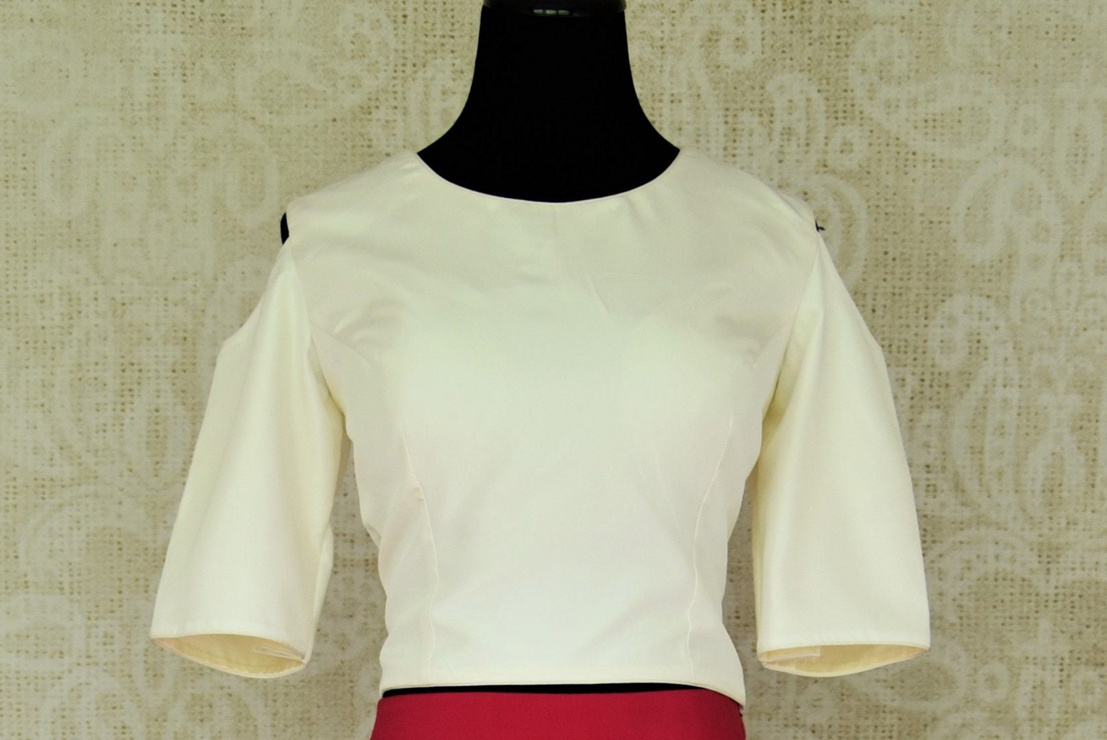 Buy white and pink Indowestern crop top with embroidered skirt online in USA. Add brilliance to your Indian look with alluring Indian designer dresses available at Pure Elegance Indian clothing store for women in USA or shop online.-crop top front