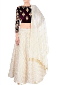 Buy off-white embroidered cotton lehenga online in USA with wine color velvet choli. Stand amongst the crowd with an exclusive range of Indian dresses, designer lehengas from Pure Elegance Indian fashion store in USA or shop online.-full view
